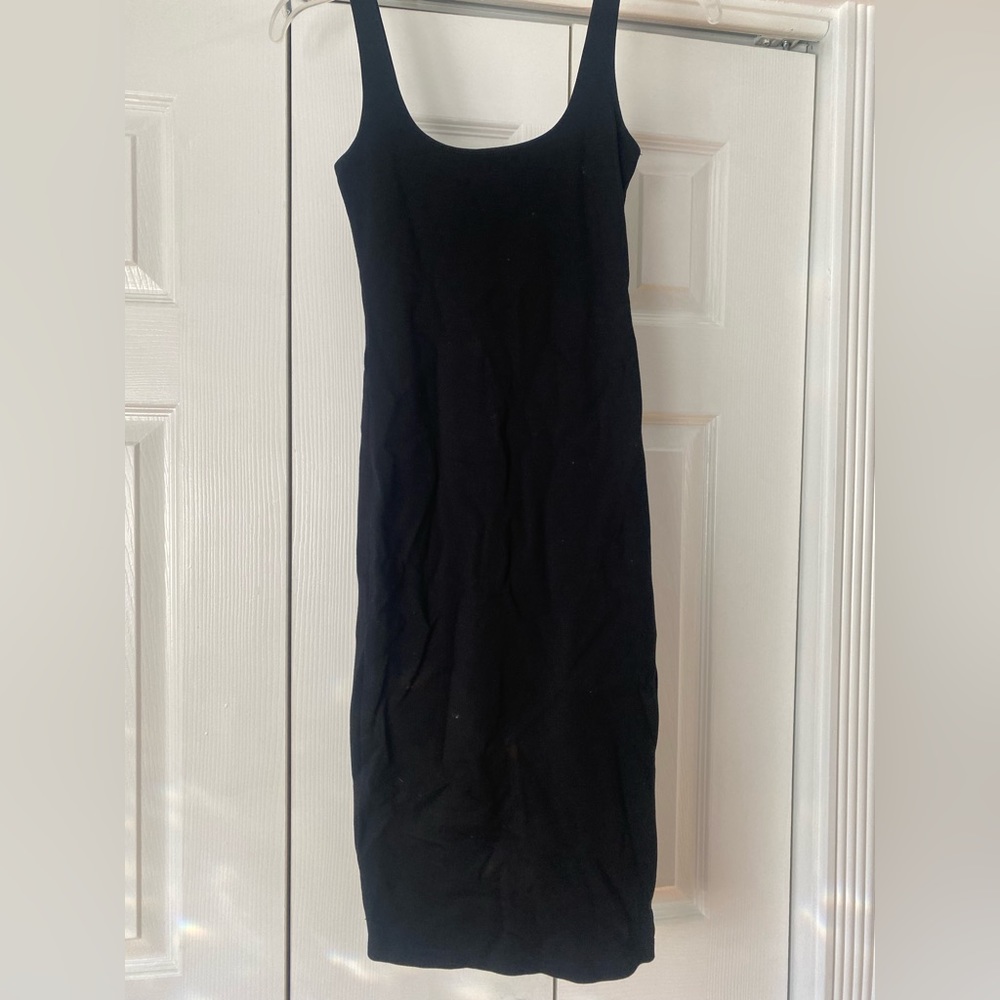 Black bodycon dress, knee length